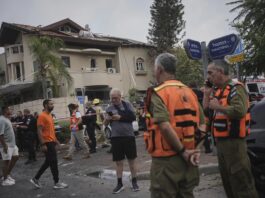 Iran hammers Israel with Missiles, dismisses Trump’s peace talks as ‘fake news’ Israeli security forces inspect a house hit by a missile fired from Iran, in Rishon Lezion, Israel.