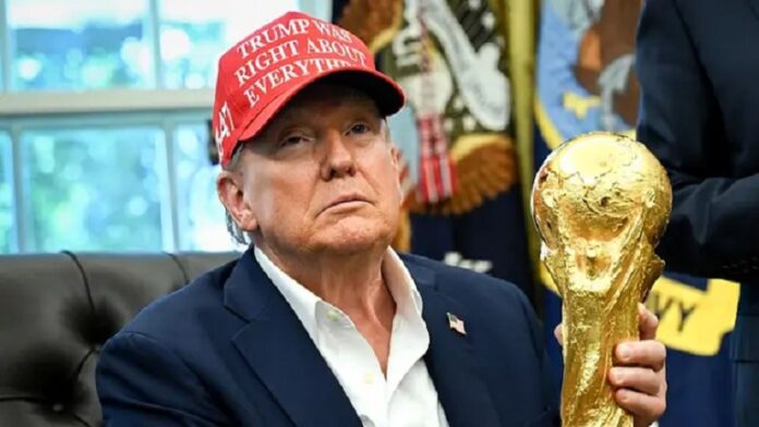 Donald Trump with World Cup trophy